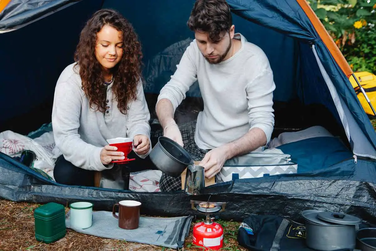 Propane heating food by the tent